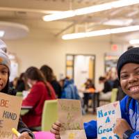 student volunteers for kids food basket